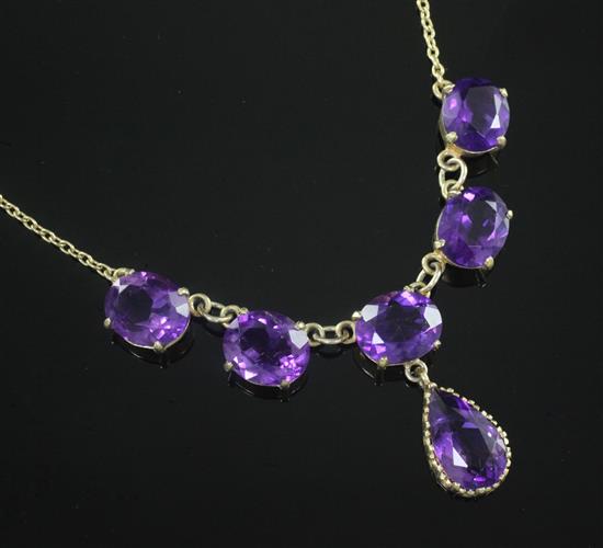 A 9ct gold and amethyst drop necklace, 46cm.